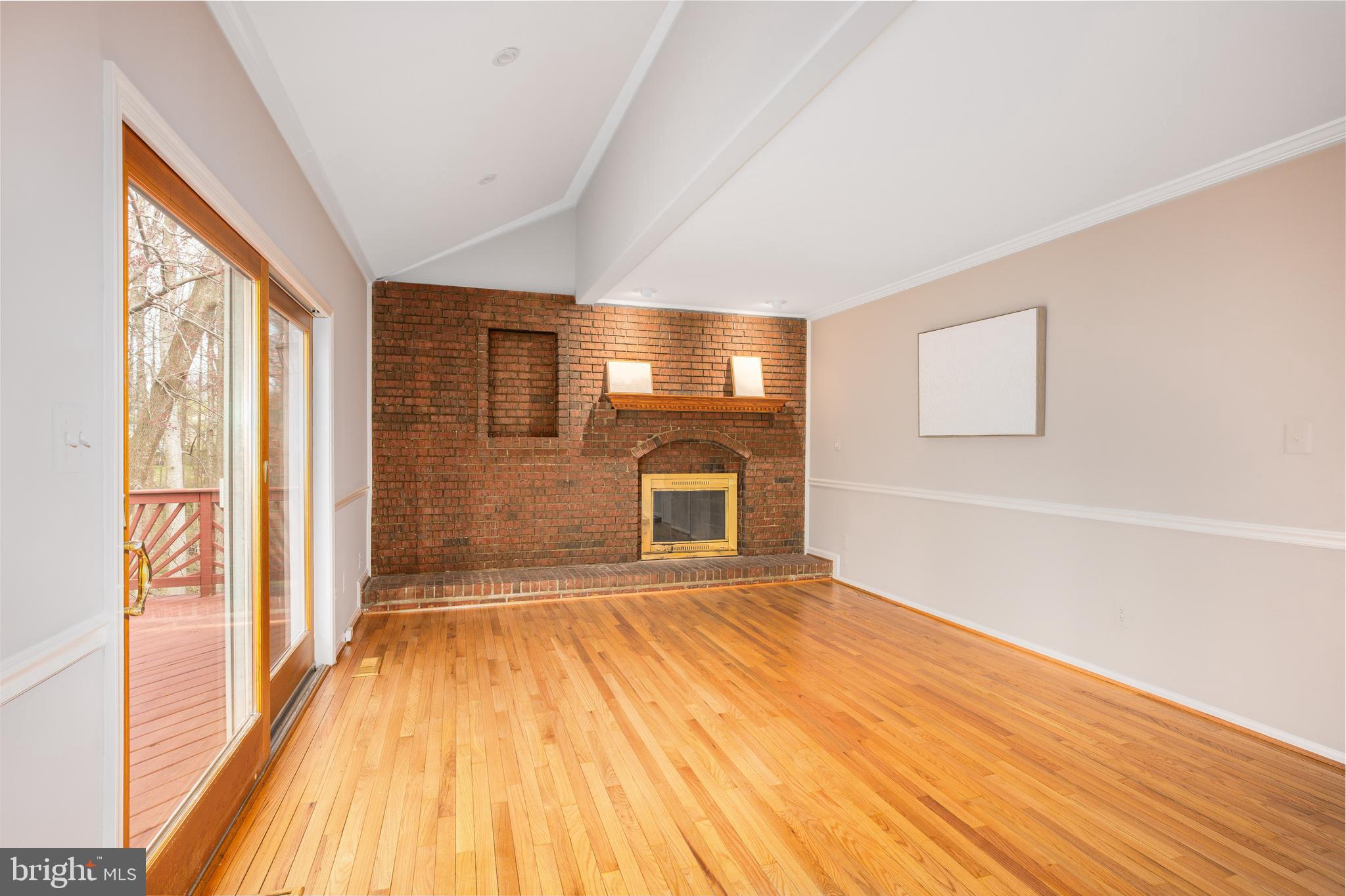 2212 Blue Valley Drive Silver Spring, MD 20904 - Photo 29 of 61 a view of an empty room with wooden floor and a window