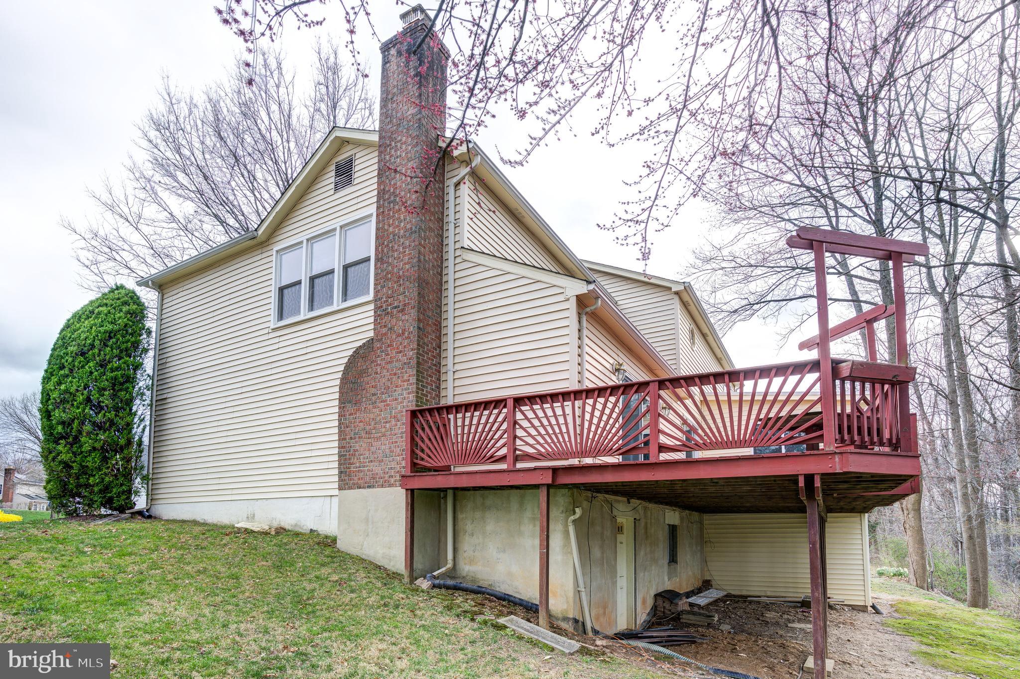 2212 Blue Valley Drive Silver Spring, MD 20904 - Photo 55 of 61 a front view of a house with garden