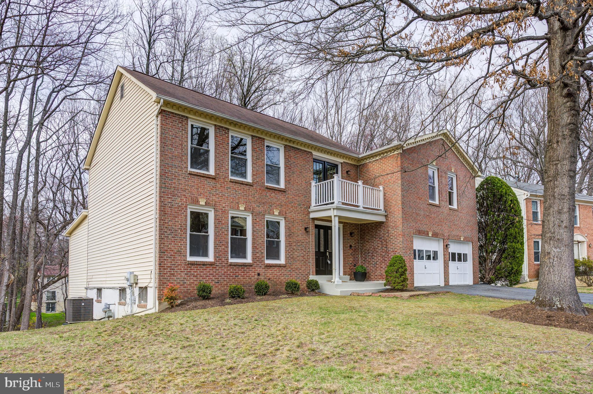 2212 Blue Valley Drive Silver Spring, MD 20904 - Photo 5 of 61 a front view of a house with a yard