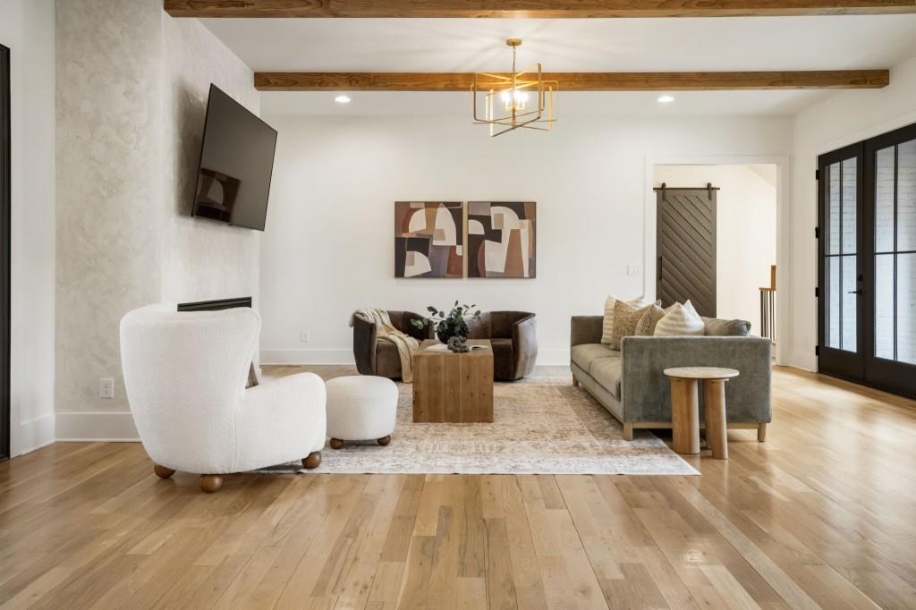 1980 Birmingham Road Milton, GA 30004 - Photo 11 of 78 a living room with furniture and a flat screen tv