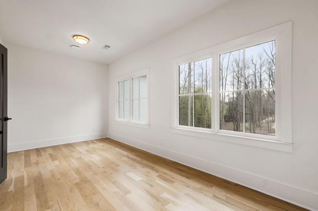 1980 Birmingham Road Milton, GA 30004 - Photo 48 of 78 a view of an empty room with a window