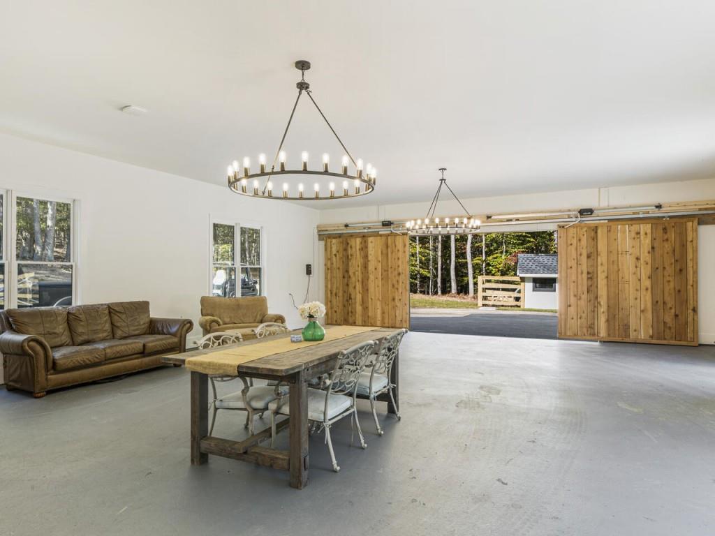1980 Birmingham Road Milton, GA 30004 - Photo 74 of 78 a view of a livingroom with furniture and window