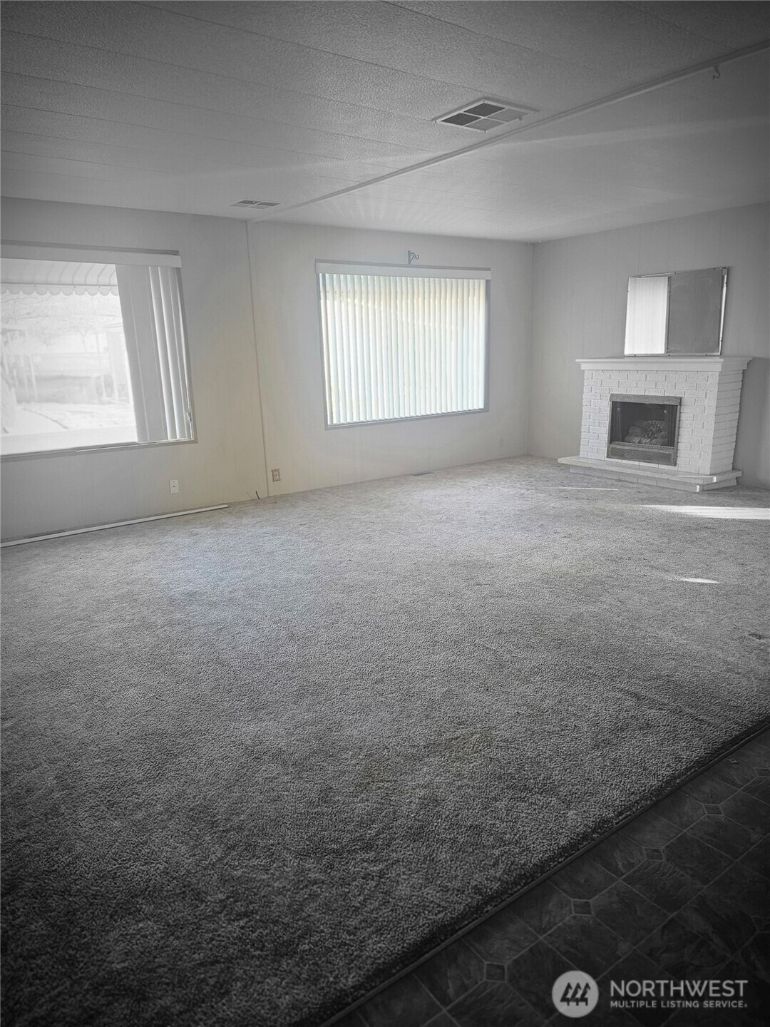 66 Jade Street Walla Walla, WA 99362 - Photo 4 of 10 a view of empty room with window