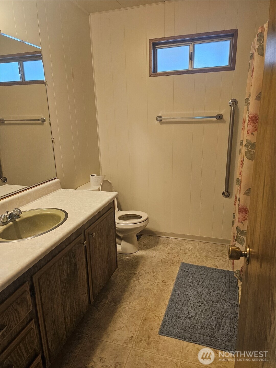 66 Jade Street Walla Walla, WA 99362 - Photo 6 of 10 a bathroom with a sink and a mirror