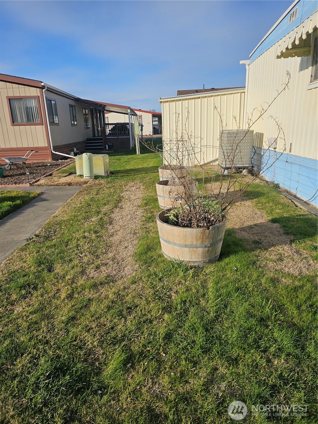 66 Jade Street Walla Walla, WA 99362 - Photo 10 of 10 a floor to ceiling window with yard and furniture