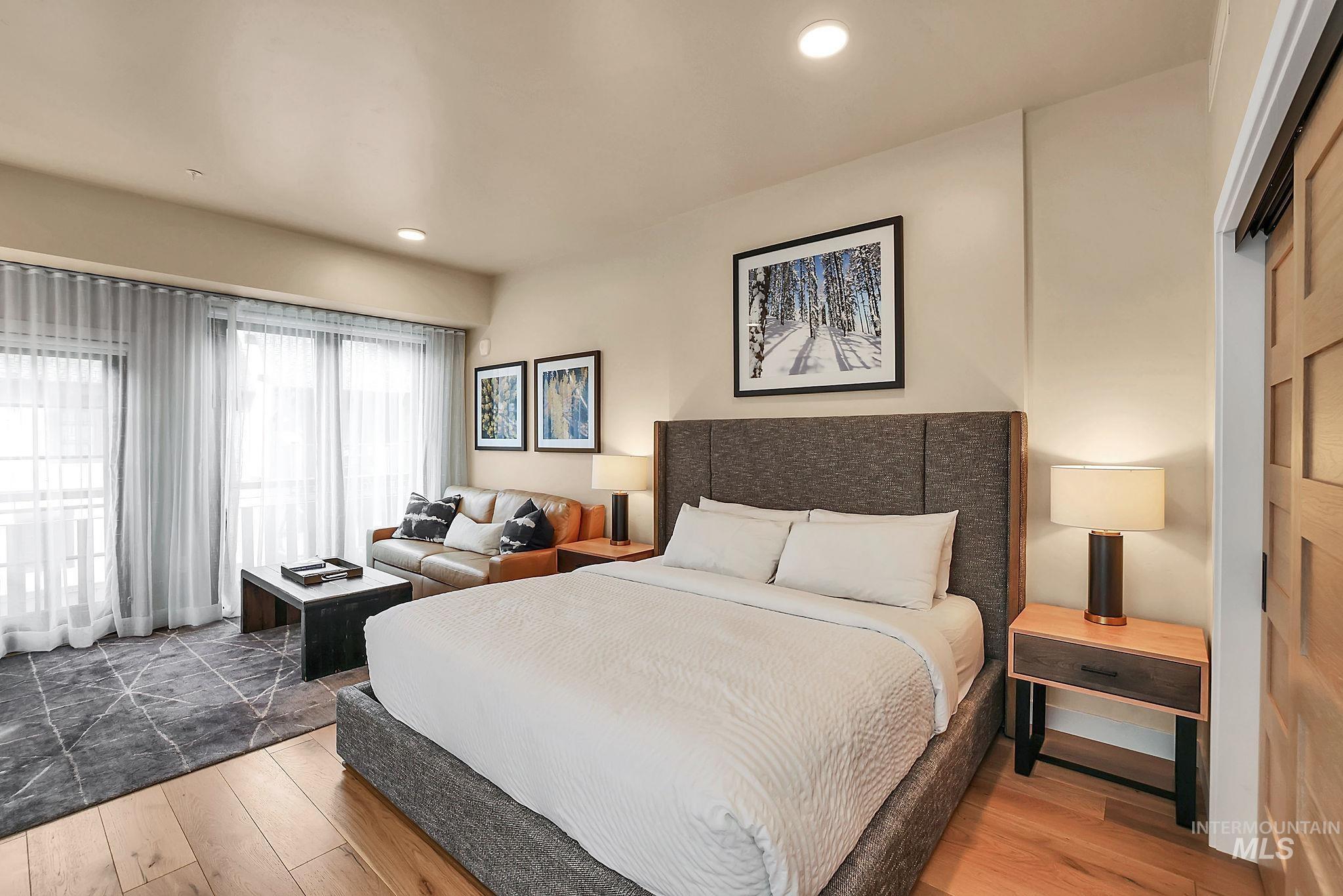 720 Village Drive, Unit 311 Donnelly, ID 83615 - Photo 11 of 37 Bedroom with wood finished floors and recessed lighting