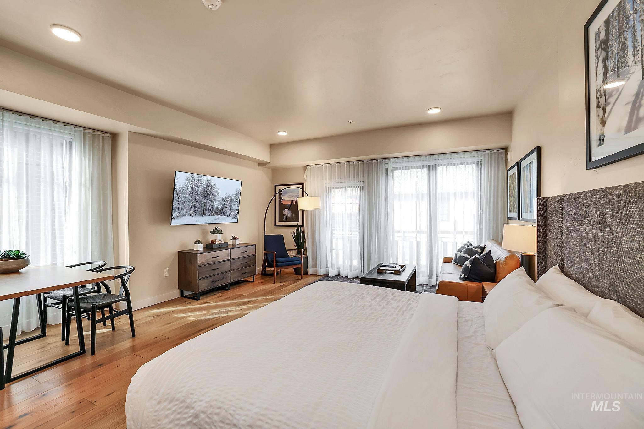 720 Village Drive, Unit 311 Donnelly, ID 83615 - Photo 12 of 37 Bedroom featuring light wood-type flooring and recessed lighting