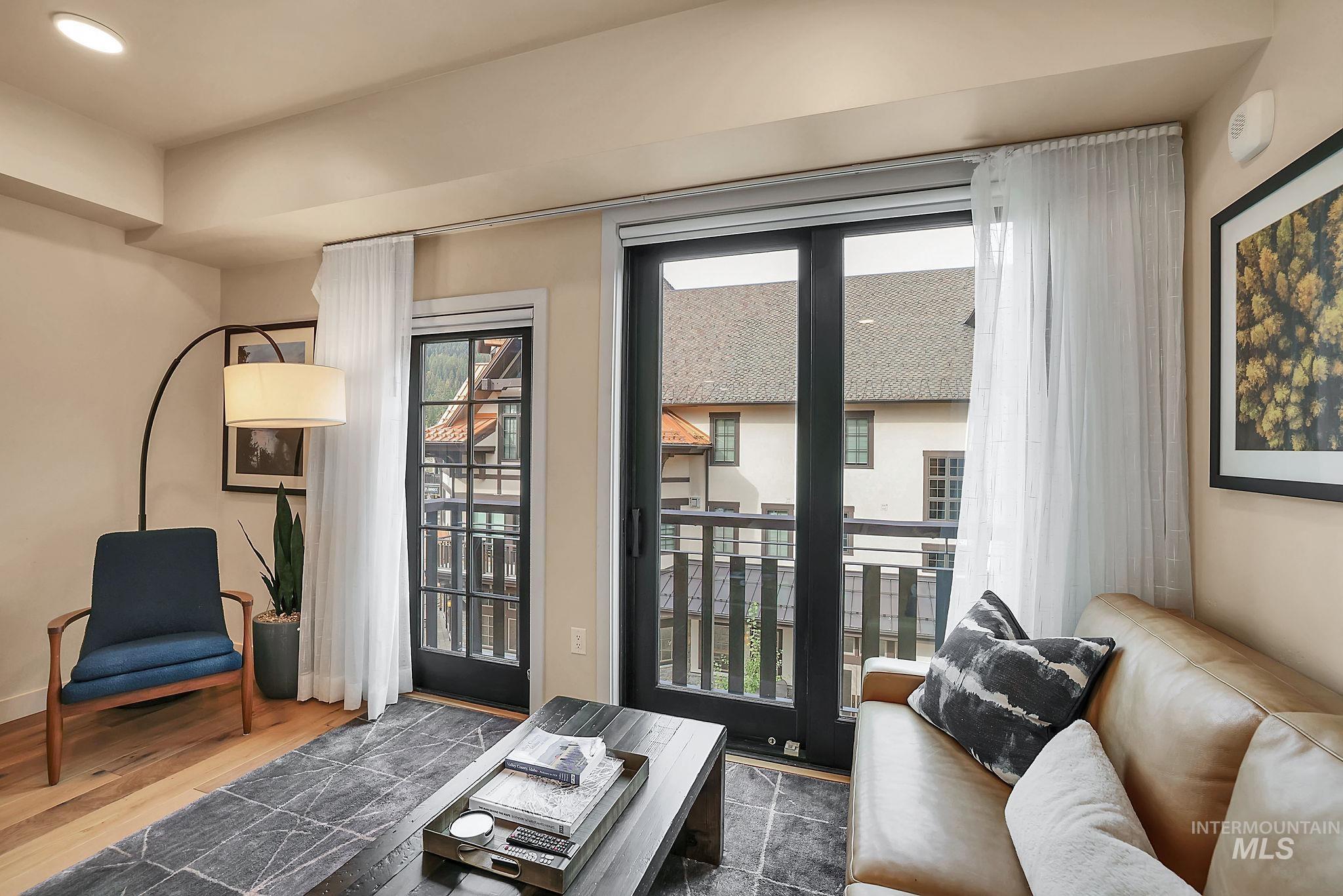 720 Village Drive, Unit 311 Donnelly, ID 83615 - Photo 15 of 37 Living area with healthy amount of natural light, wood finished floors, and recessed lighting