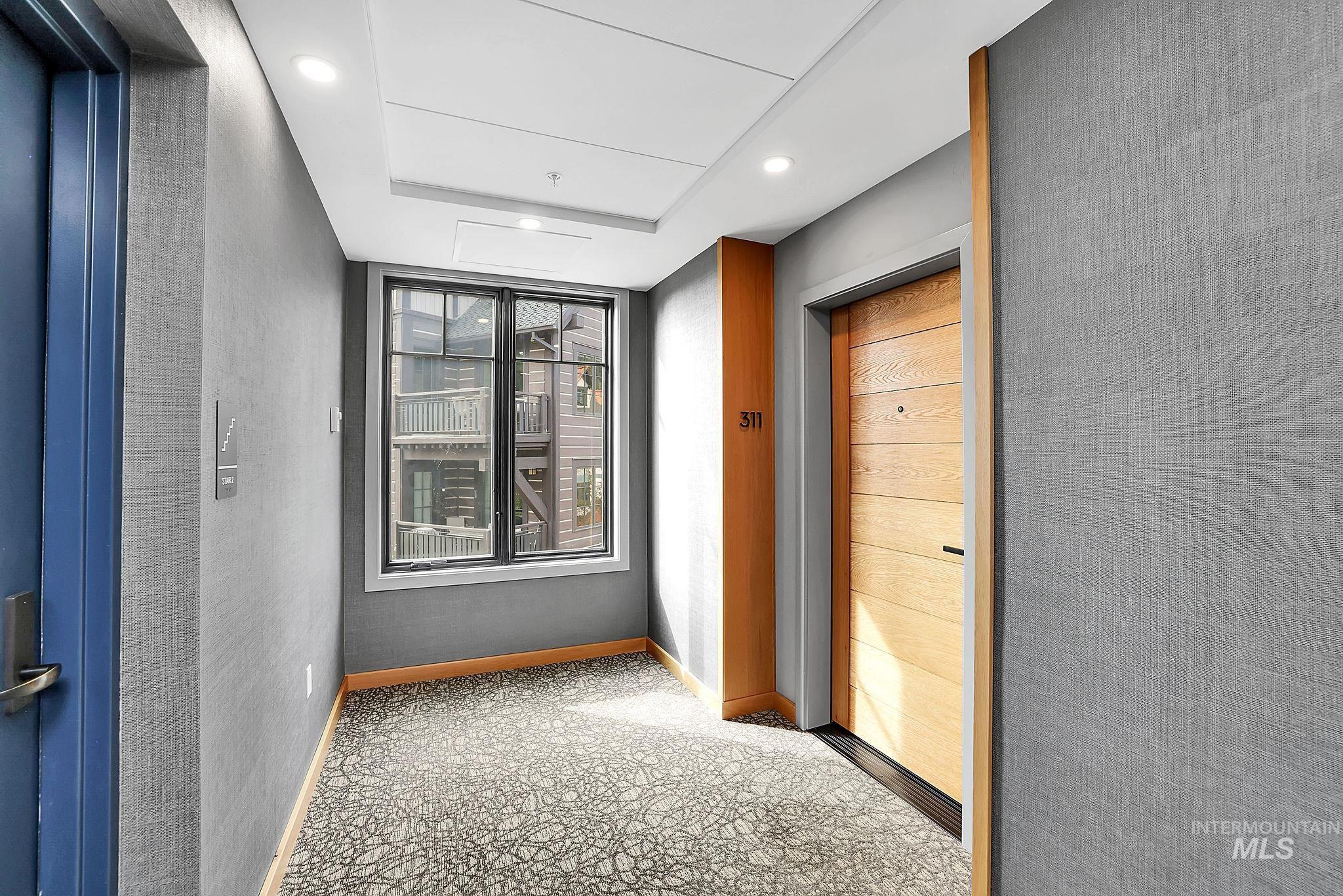 720 Village Drive, Unit 311 Donnelly, ID 83615 - Photo 19 of 37 Hall with baseboards and recessed lighting