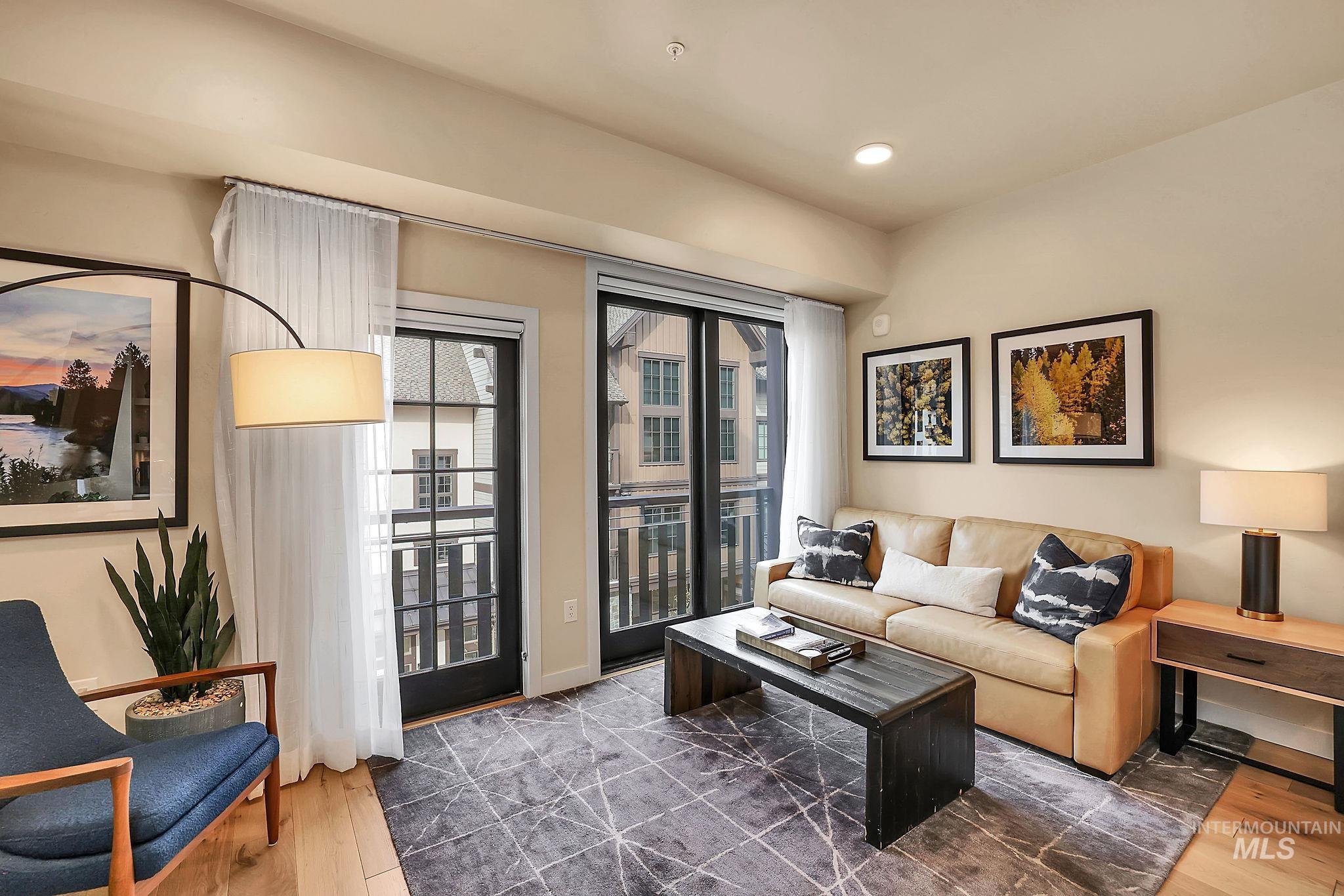 720 Village Drive, Unit 311 Donnelly, ID 83615 - Photo 4 of 37 Living room featuring wood finished floors and recessed lighting