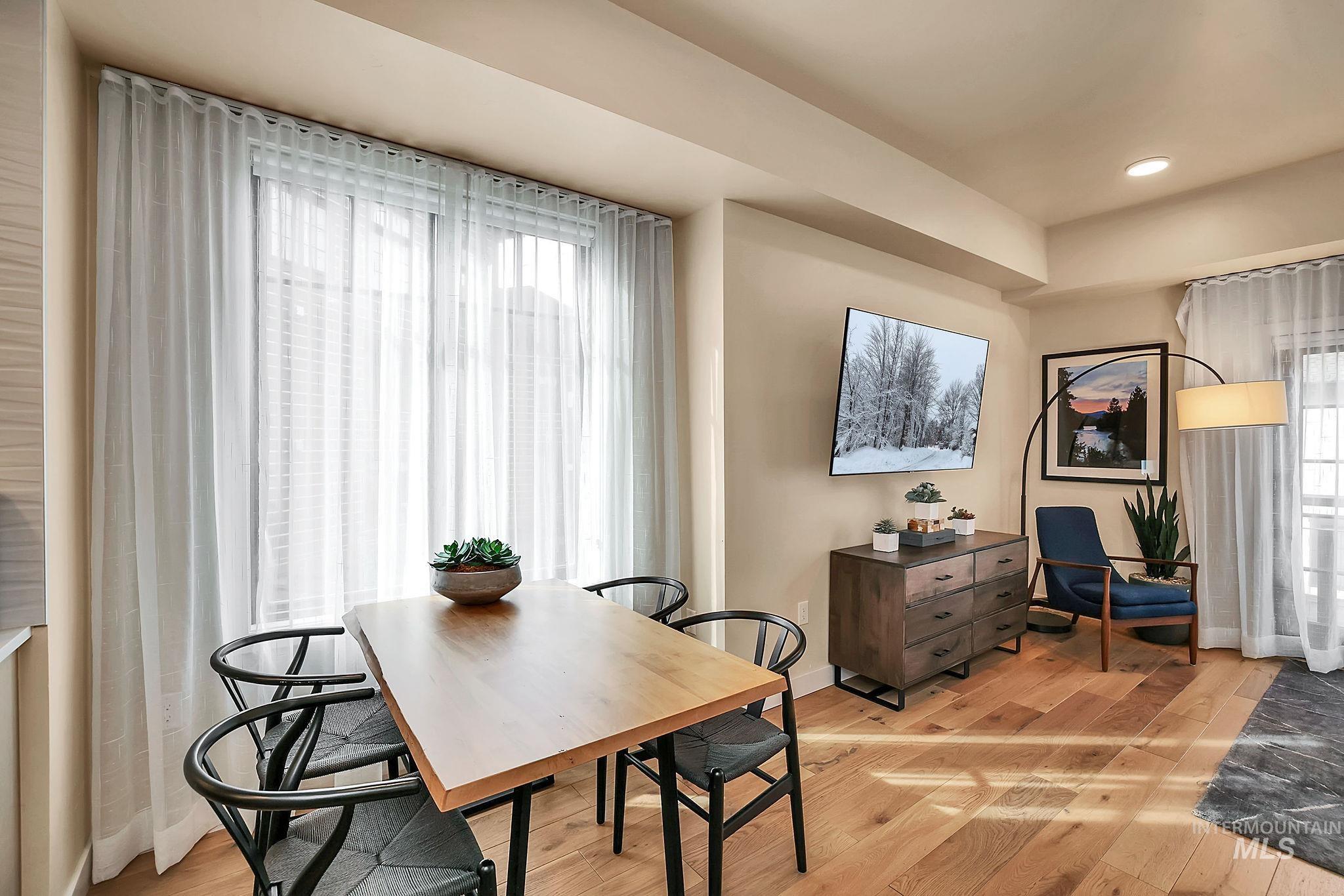 720 Village Drive, Unit 311 Donnelly, ID 83615 - Photo 10 of 37 Dining room featuring light wood finished floors and recessed lighting