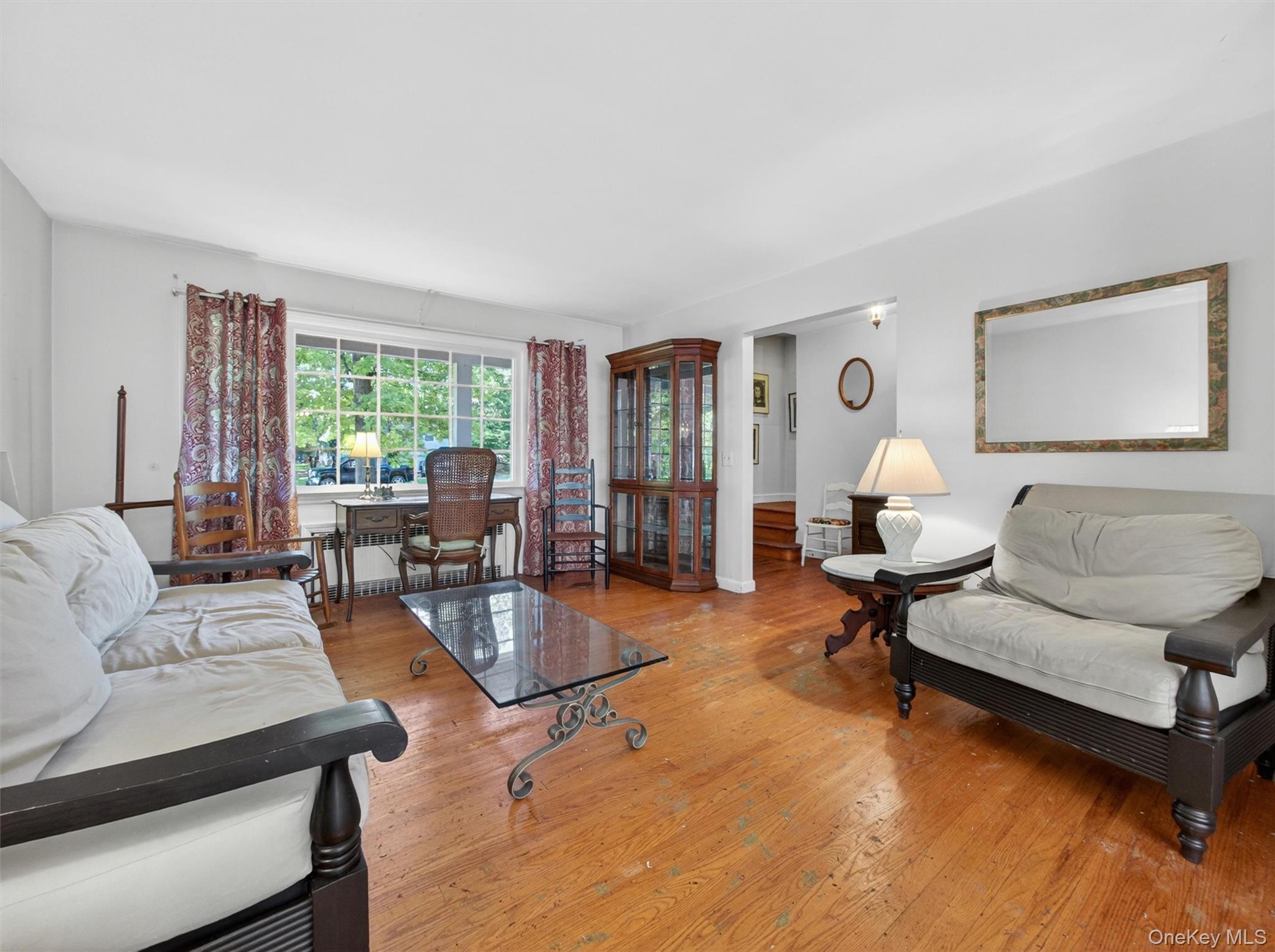 56 Oak Road New City, NY 10956 - Photo 6 of 30 a living room with furniture and a wooden floor