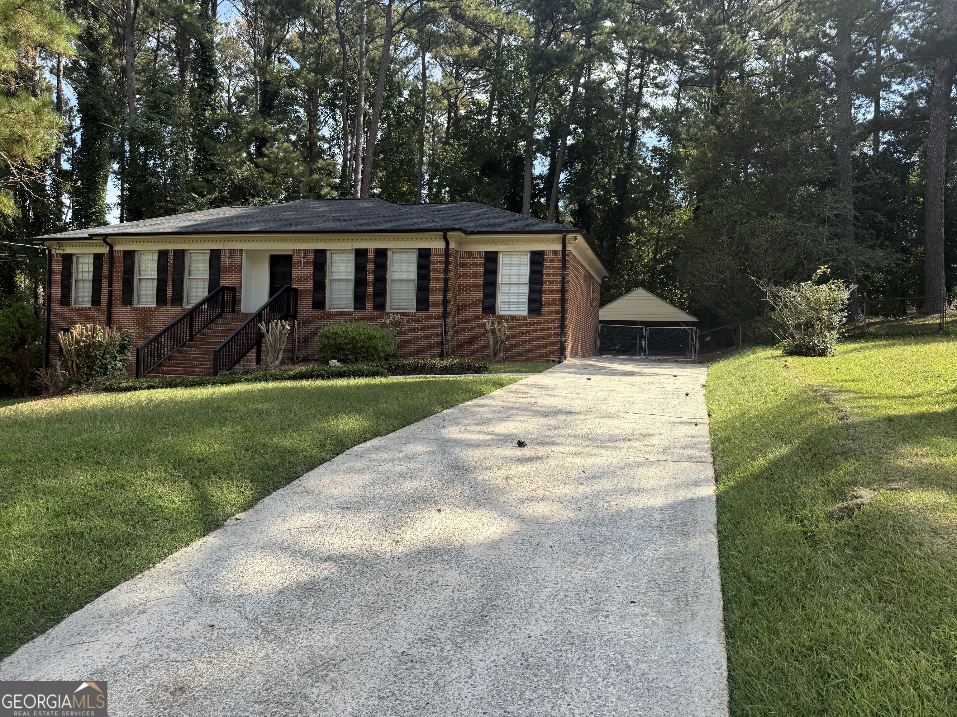 1832 King George Lane Southwest Atlanta, GA 30331 - Photo 2 of 28 a view of house with yard and green space
