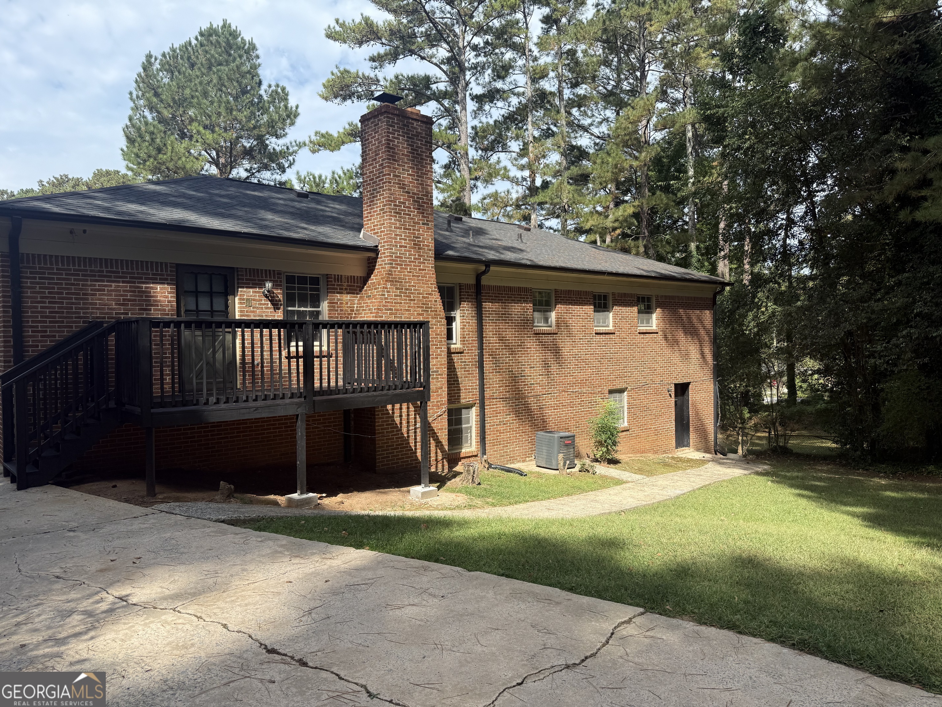 1832 King George Lane Southwest Atlanta, GA 30331 - Photo 3 of 28 a front view of a house with a yard