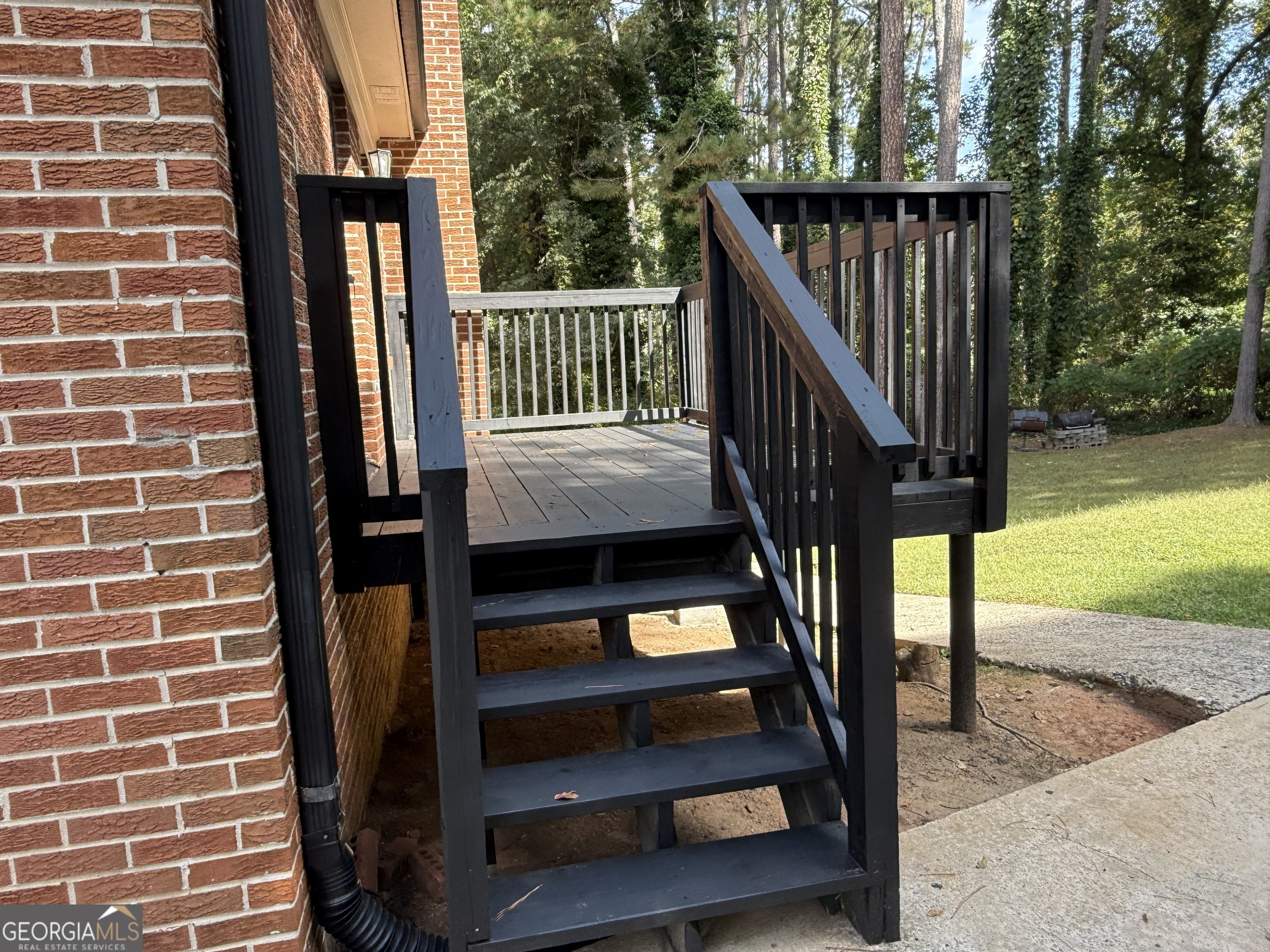 1832 King George Lane Southwest Atlanta, GA 30331 - Photo 4 of 28 a view of balcony with wooden floor and outdoor space