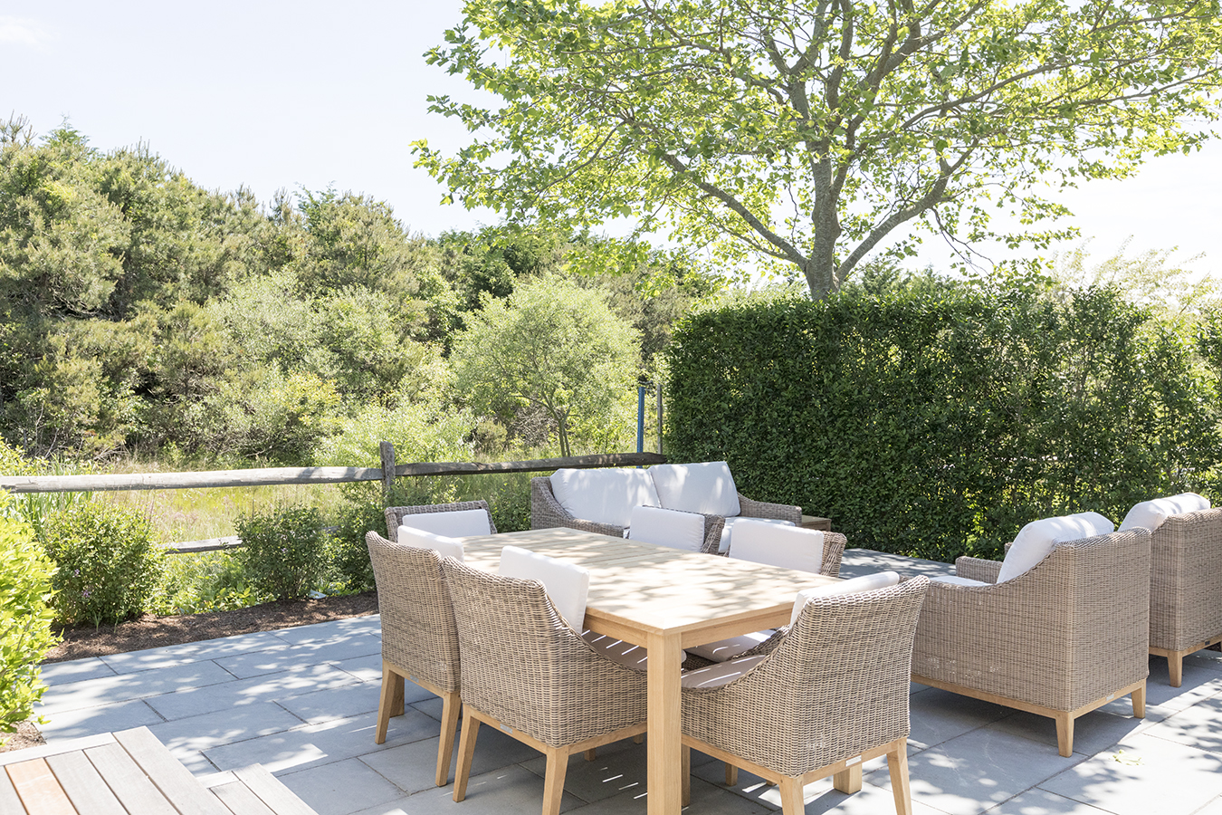 12 Wood Lily Road Nantucket, MA 02554 - Photo 9 of 70 a view of a patio with a table and chairs