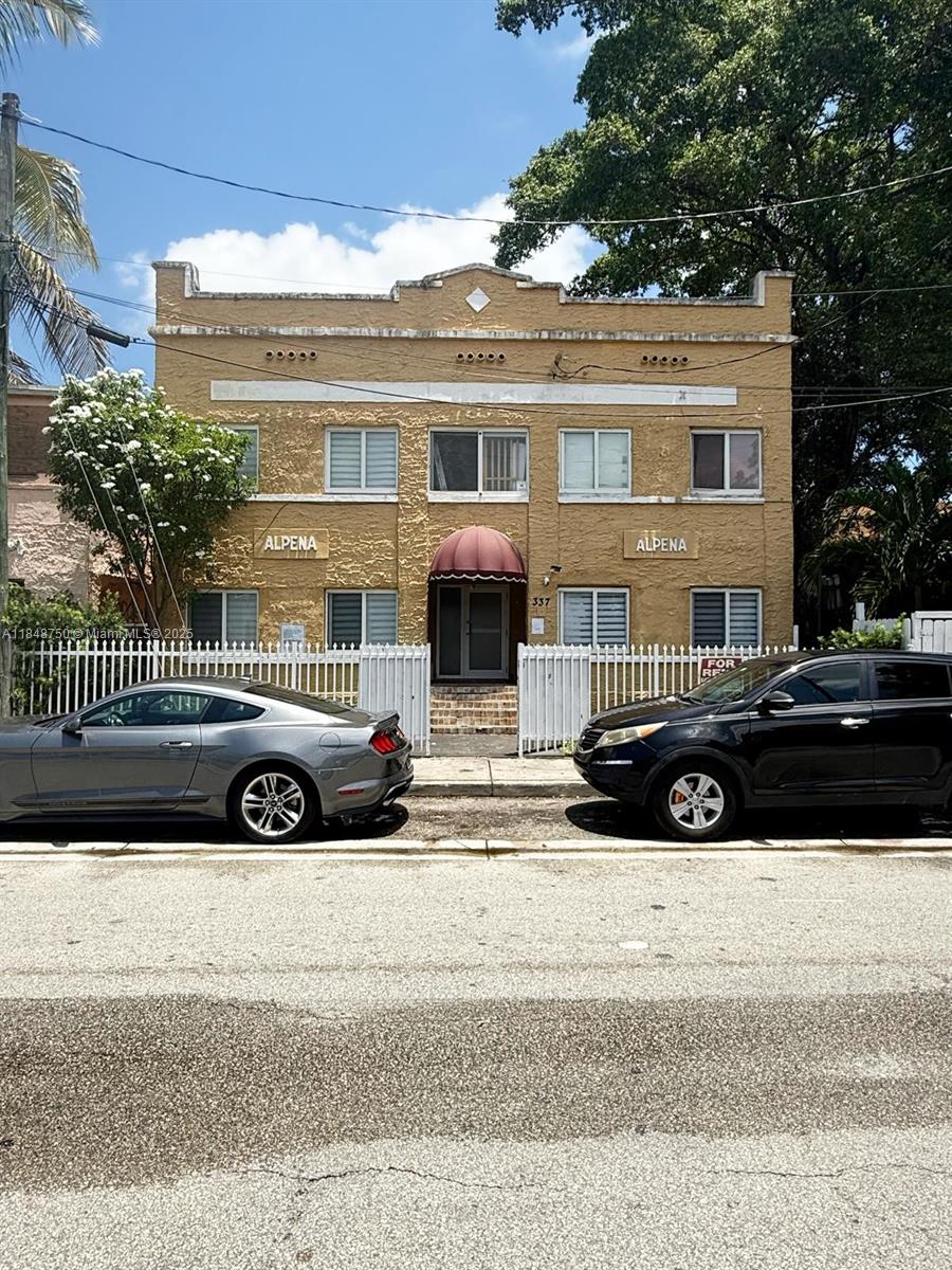 337 Southwest 10th Avenue, Unit 3 Miami, FL 33130 - Photo 7 of 7 a car parked in front of a house