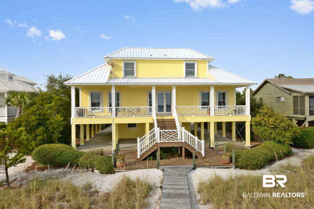 33168 River Road Orange Beach, AL 36561 - Photo 7 of 11 First level double carports with decks and second level large covered balcony-all overlooking Old River, Florida State Preserve and Gulf of Mexico- Unbelievable Views!