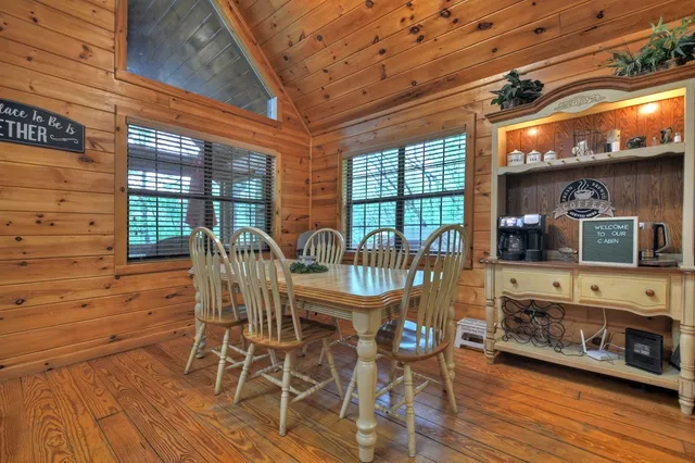 a living room with furniture and windows