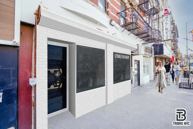 a view of a hallway with a glass door and door