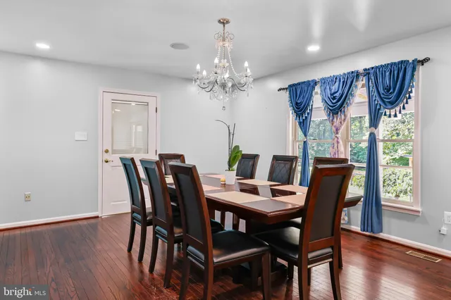 a kitchen with stainless steel appliances granite countertop a stove and a microwave