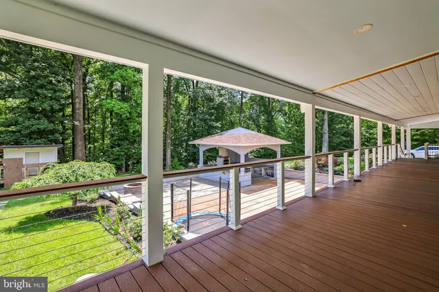 a front view of a house with a yard table and chairs
