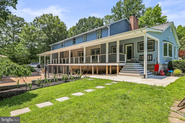 a backyard of a house with lots of green space