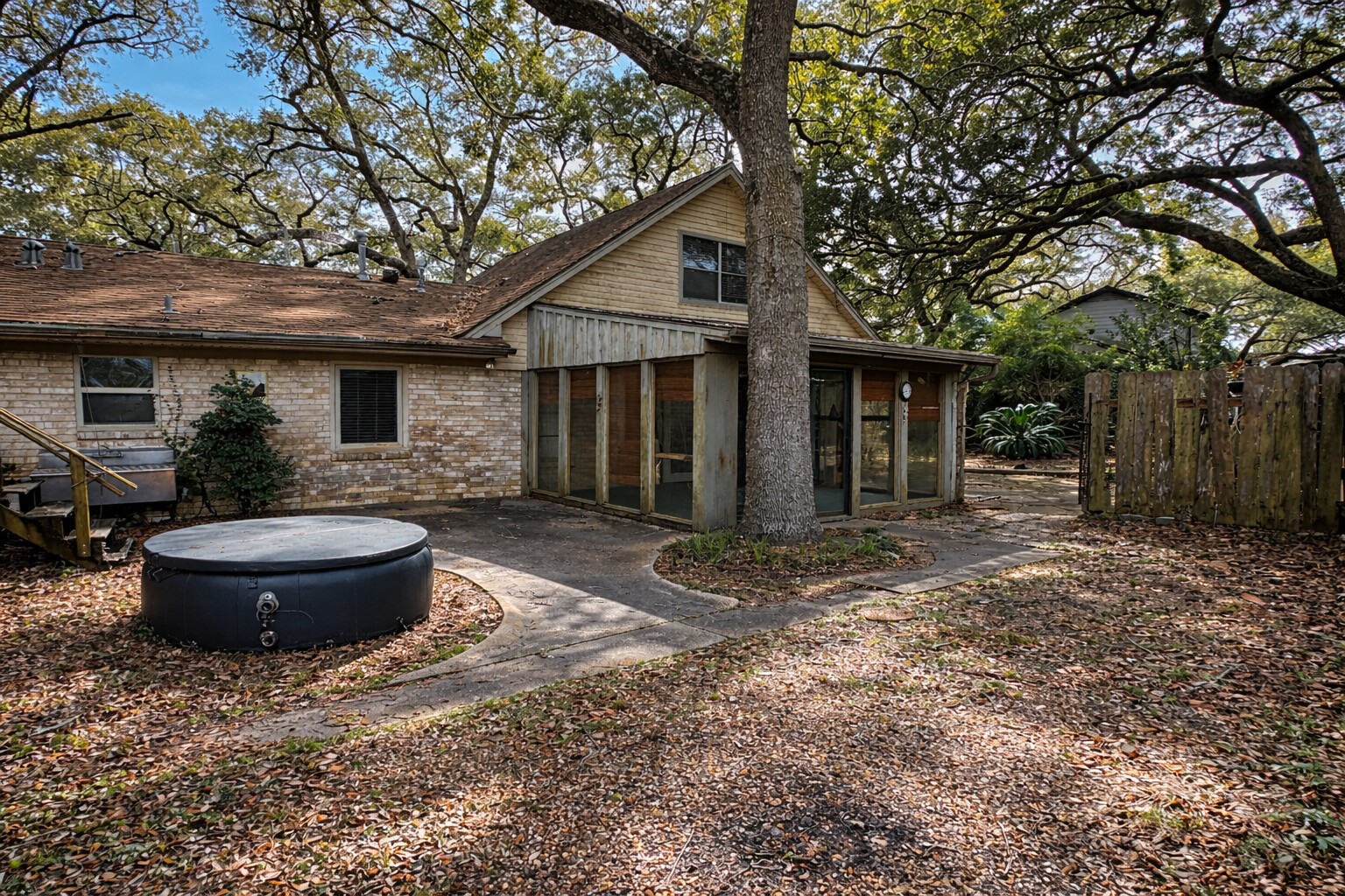 202 Hardy Street Bacliff, TX 77518 - Photo 16 of 21 a backyard of house with barbeque oven