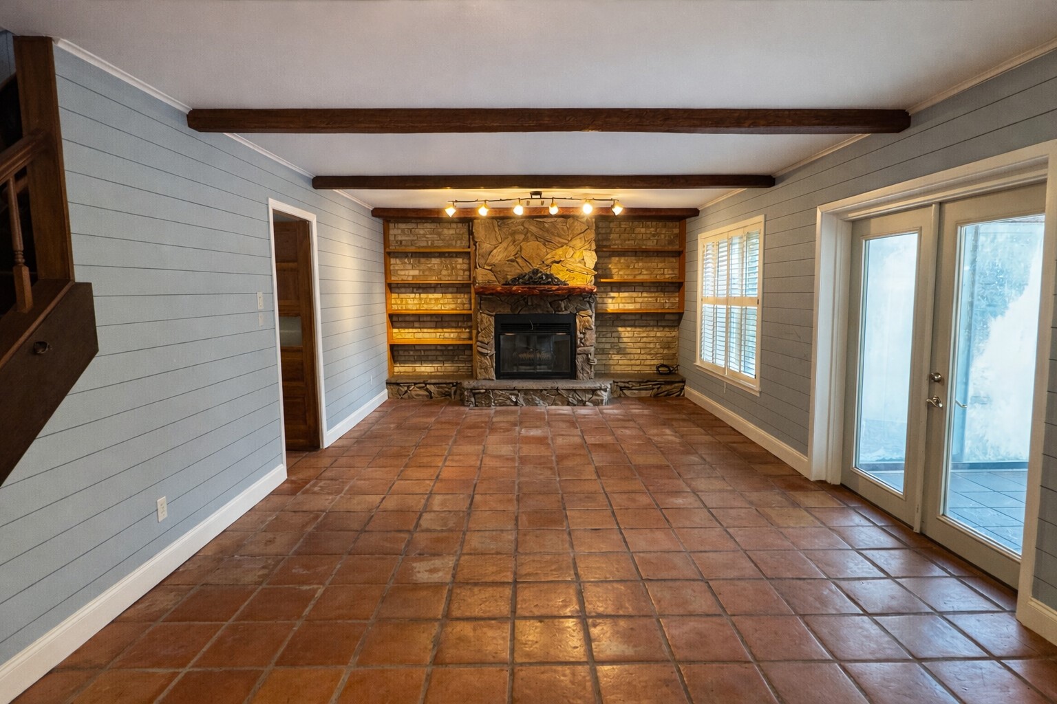 202 Hardy Street Bacliff, TX 77518 - Photo 3 of 21 a view of empty room with wooden floor and fireplace