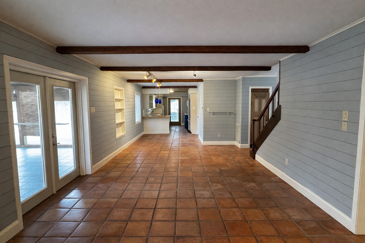 202 Hardy Street Bacliff, TX 77518 - Photo 4 of 21 a hallway with beautiful frames and flower plants
