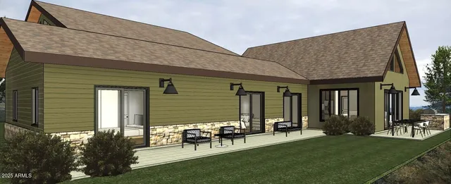 a backyard of a house with table and chairs