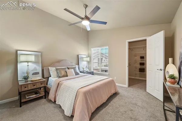 a bedroom with a bed and a cabinets