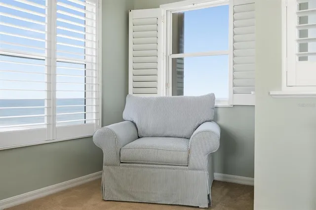 a view of a chairs and table in the patio