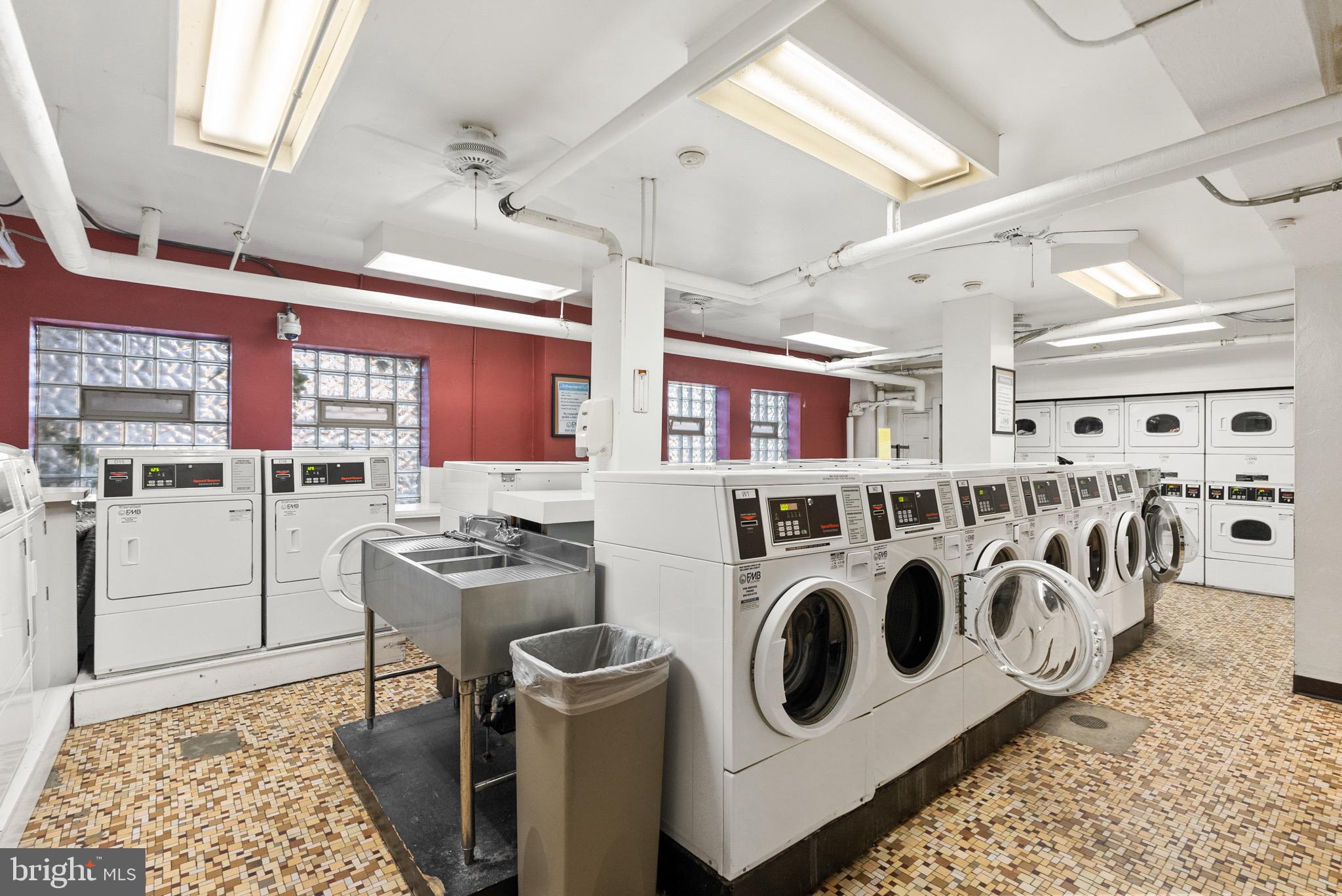 2500 Q Street Northwest, Unit 214 Washington, DC 20007 - Photo 15 of 18 Convenient laundry room with multiple washers
