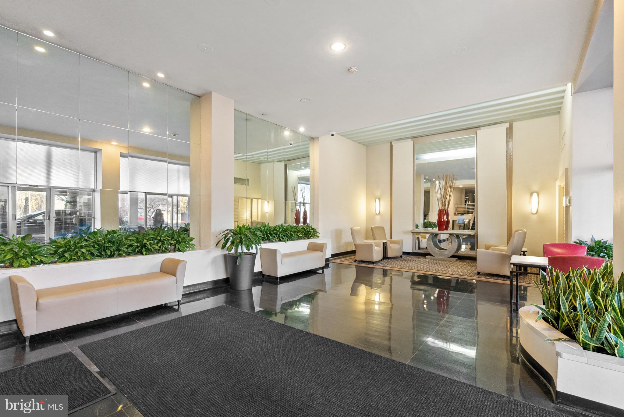 2500 Q Street Northwest, Unit 214 Washington, DC 20007 - Photo 16 of 18 24-hour front desk and comfortable seating areas