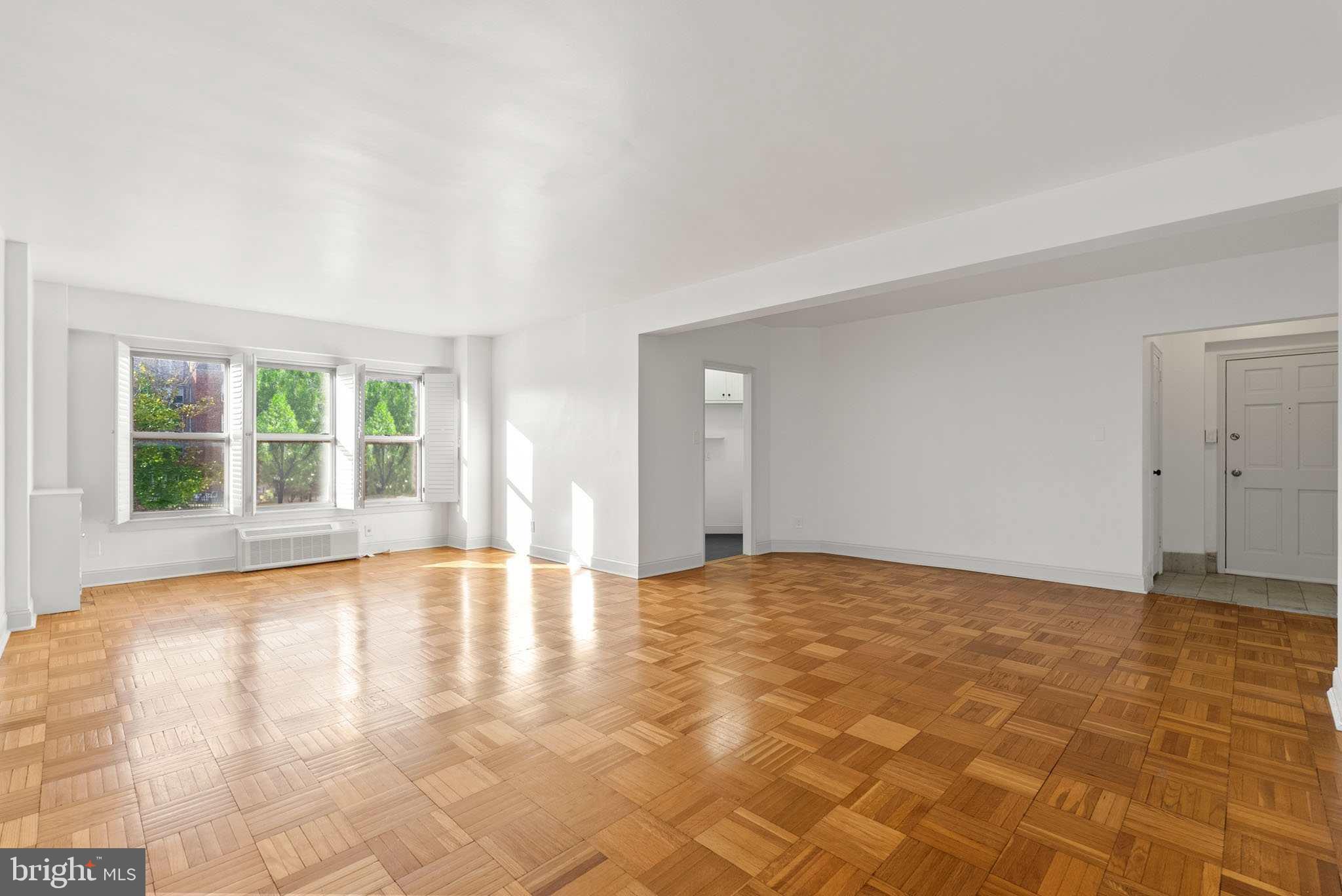 2500 Q Street Northwest, Unit 214 Washington, DC 20007 - Photo 2 of 18 Spacious, living room with classic parquet floors