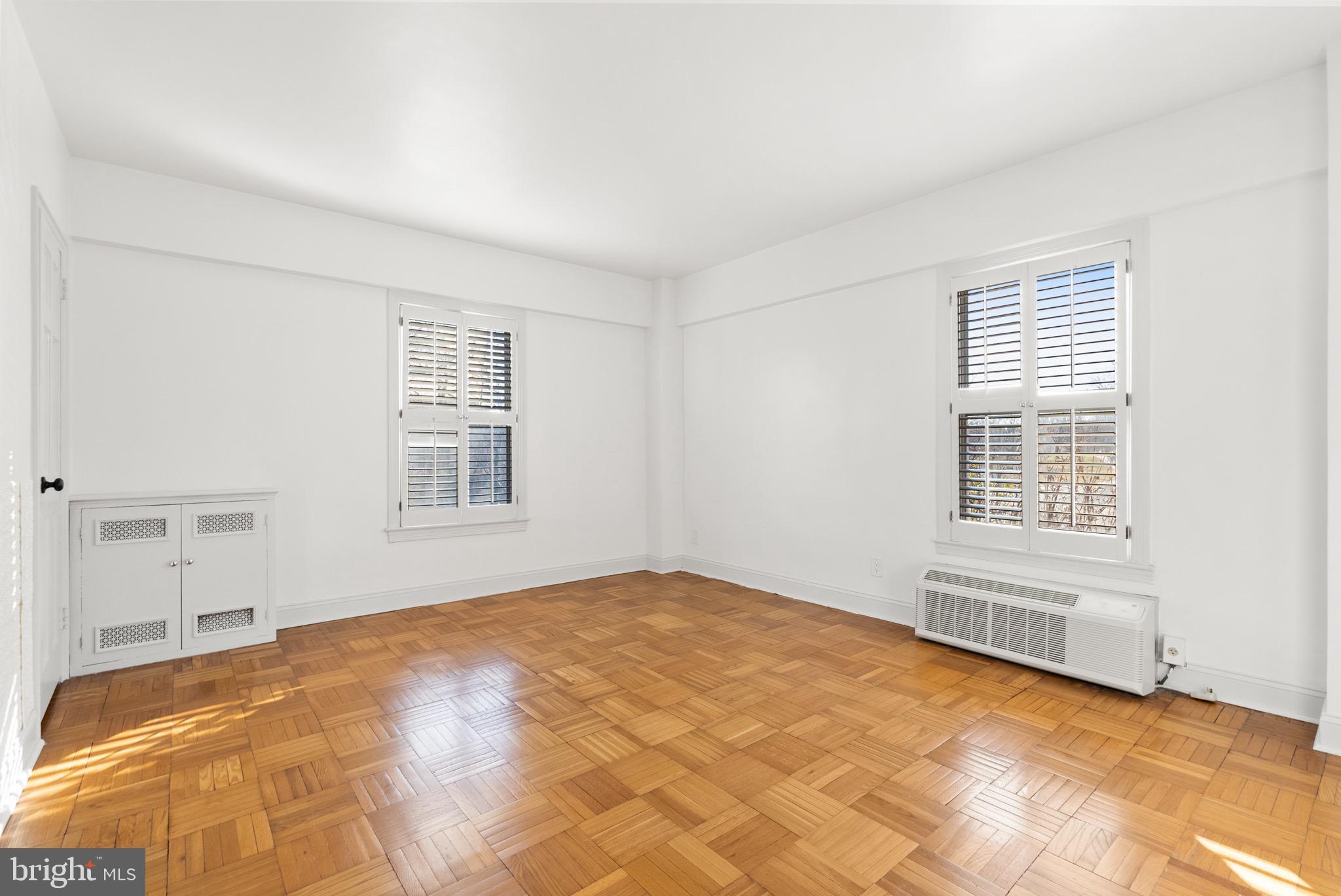 2500 Q Street Northwest, Unit 214 Washington, DC 20007 - Photo 7 of 18 Spacious primary bedroom with natural light