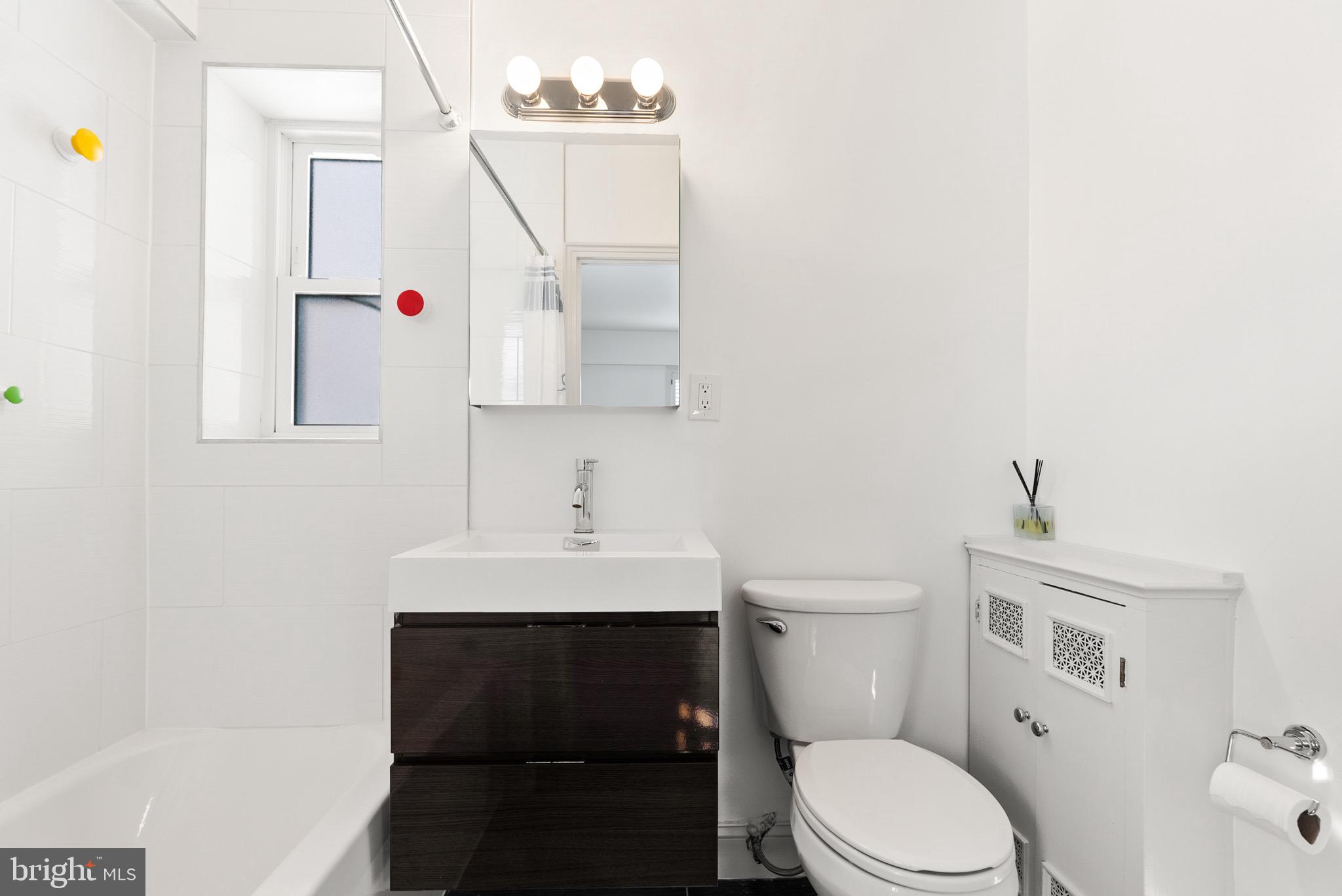 2500 Q Street Northwest, Unit 214 Washington, DC 20007 - Photo 8 of 18 Updated en-suite bath with modern fixtures