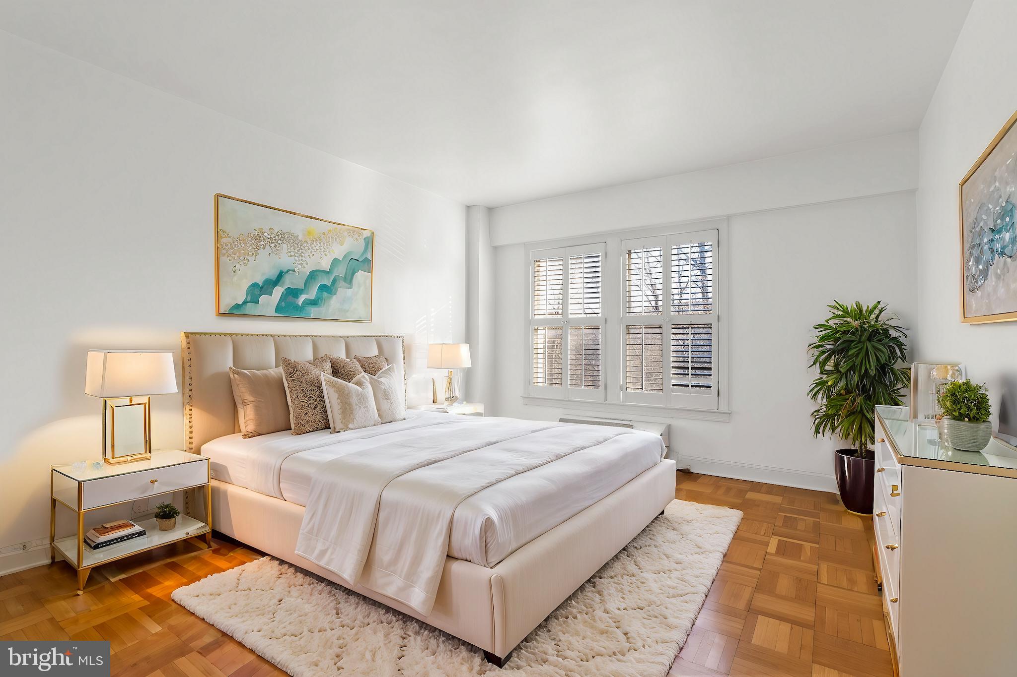 2500 Q Street Northwest, Unit 214 Washington, DC 20007 - Photo 10 of 18 Bright guest bedroom with serene ambiance
