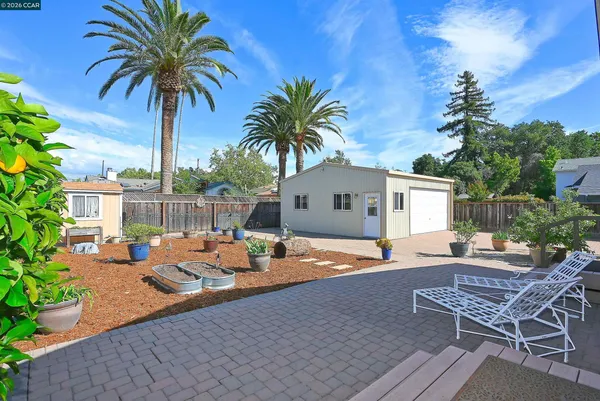 a backyard of a house with seating space