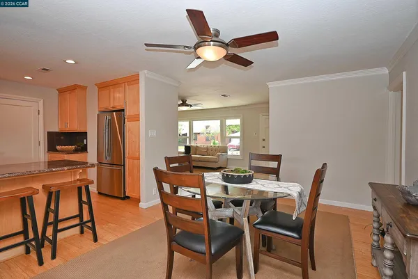 a view of a dining room with furniture