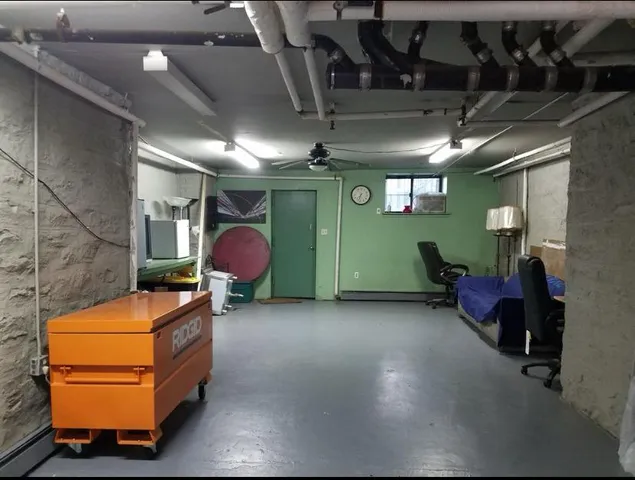 a room with furniture and a chandelier