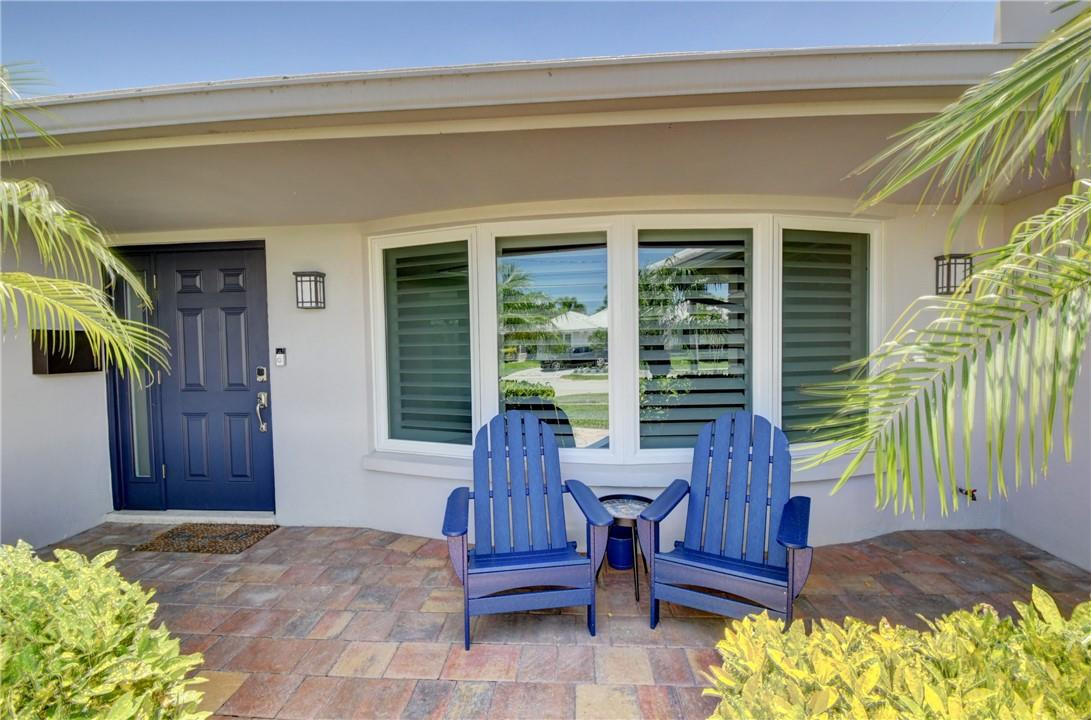 1163 Mulberry Way Boca Raton, FL 33486 - Photo 16 of 66 a balcony with furniture and a potted plant