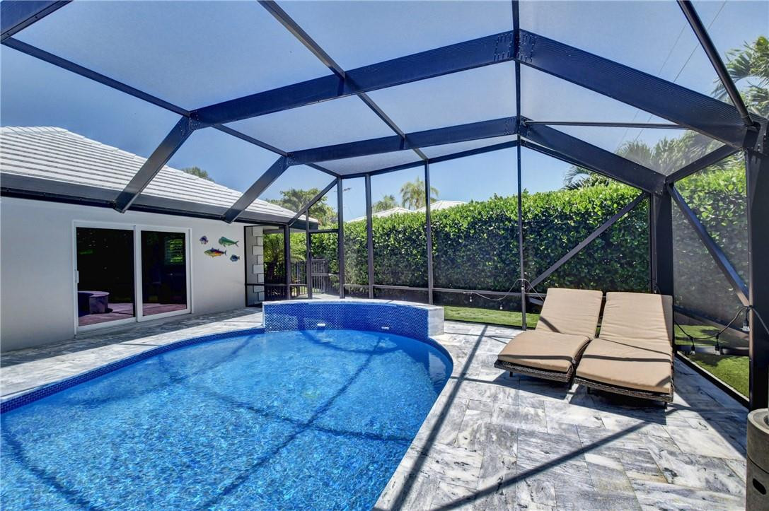 1163 Mulberry Way Boca Raton, FL 33486 - Photo 20 of 66 a view of patio with chairs and a yard