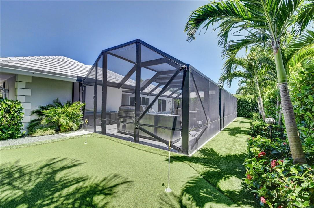 1163 Mulberry Way Boca Raton, FL 33486 - Photo 29 of 66 a view of a backyard with plants