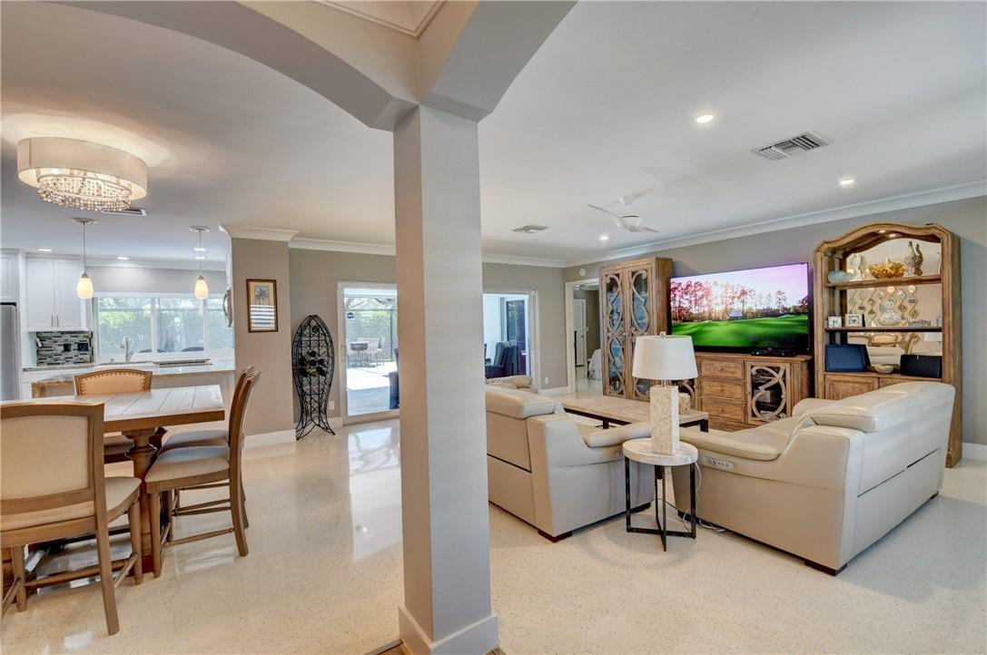 1163 Mulberry Way Boca Raton, FL 33486 - Photo 32 of 66 a living room with fireplace furniture and a large window