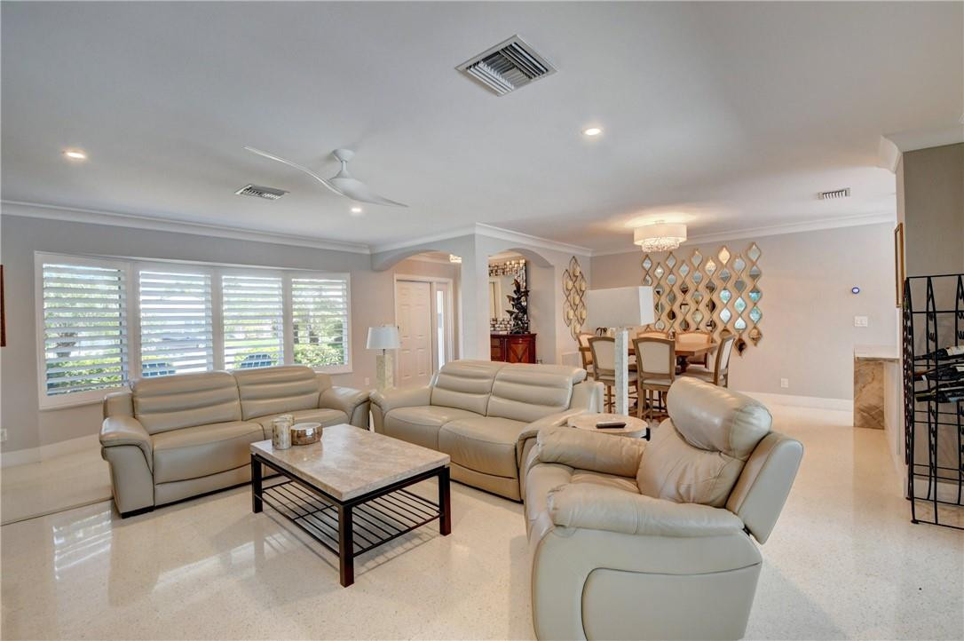 1163 Mulberry Way Boca Raton, FL 33486 - Photo 37 of 66 a living room with furniture and a large window