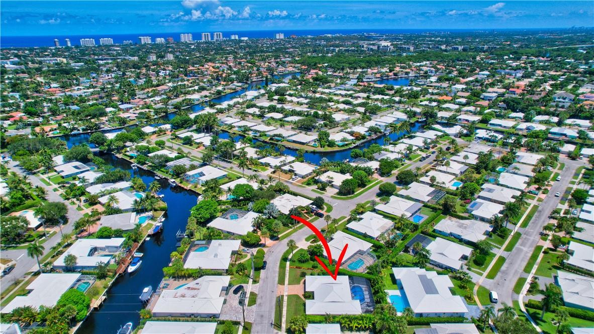 1163 Mulberry Way Boca Raton, FL 33486 - Photo 5 of 66 an aerial view of residential houses with city view