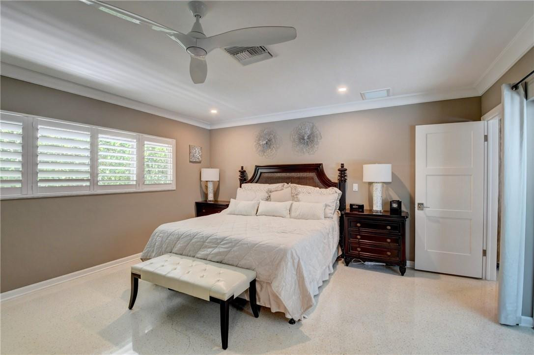 1163 Mulberry Way Boca Raton, FL 33486 - Photo 55 of 66 a bedroom with a bed dresser and a window