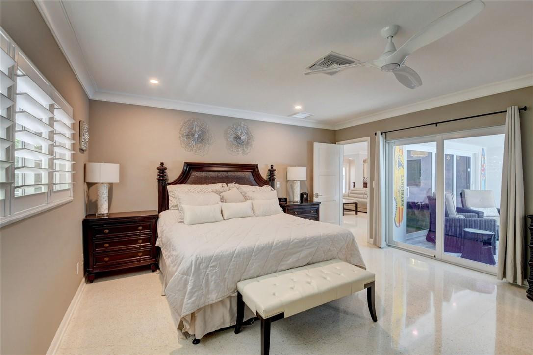 1163 Mulberry Way Boca Raton, FL 33486 - Photo 56 of 66 a bedroom with a bed and window